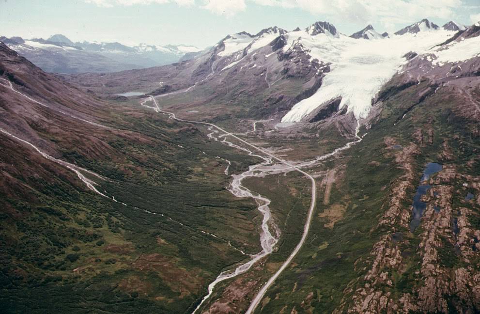 A view west toward Worthington Glacier and Thompson Pass near Valdez, Alaska, where the pipeline will parallel the Richardson Highway, 1974.