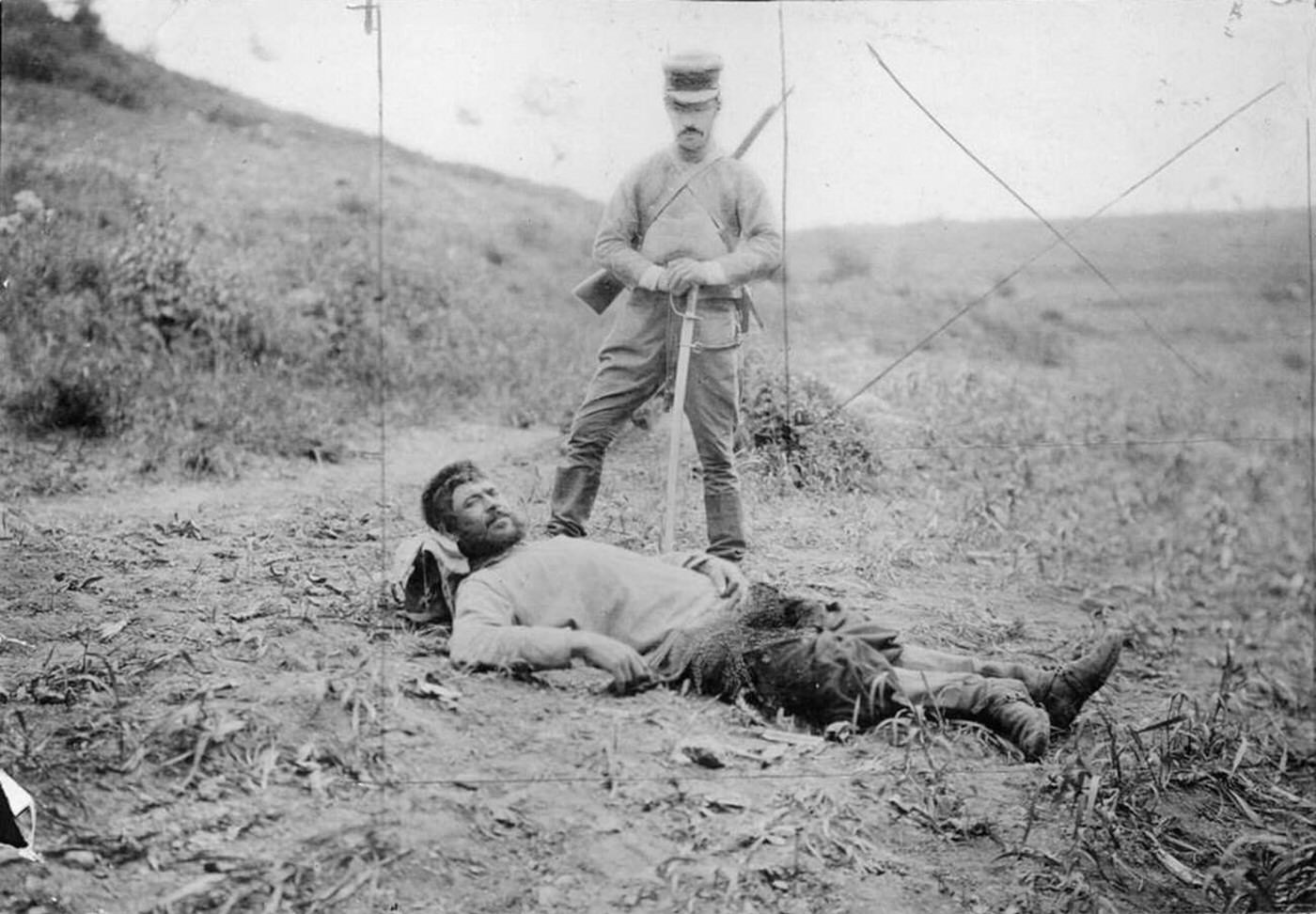 A Russian soldier captured by Japanese forces during the Battle of Motien Pass, Russo-Japanese War, 1904.