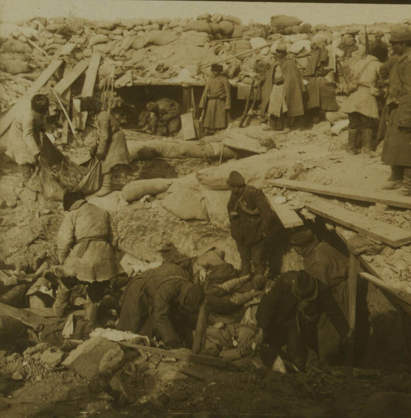Japanese buried by Russians inside fort, where every man entering was killed by bayonet in Port Arthur.