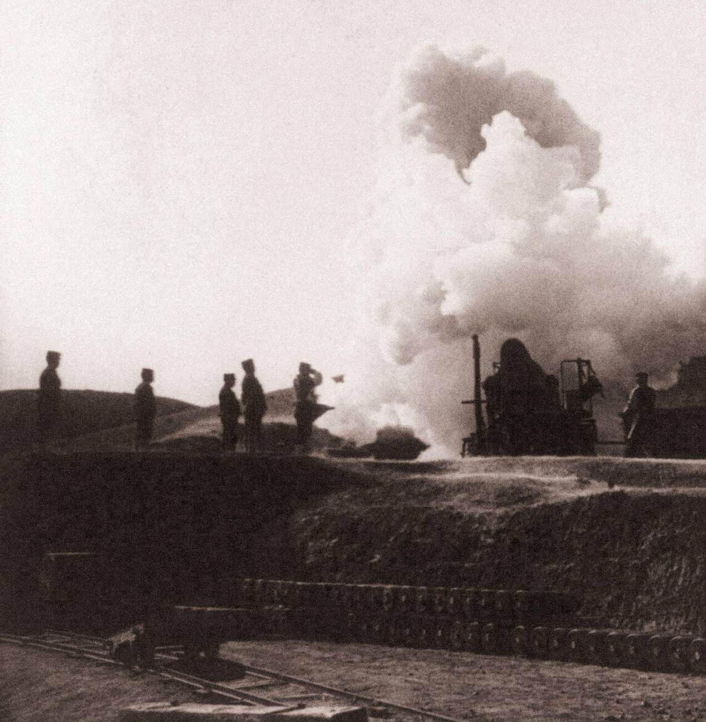 Enormous 11-inch shell from a Japanese siege gun beginning its deadly flight into Port Arthur, China, during the Russo-Japanese War, 1900s.