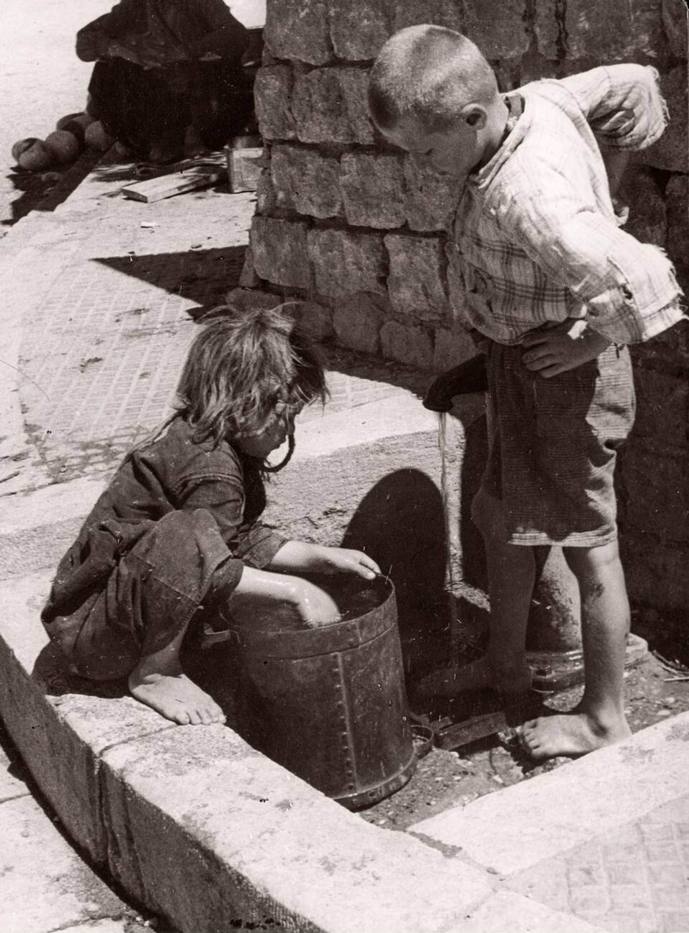 Children getting water from a well in Syria, 1843.