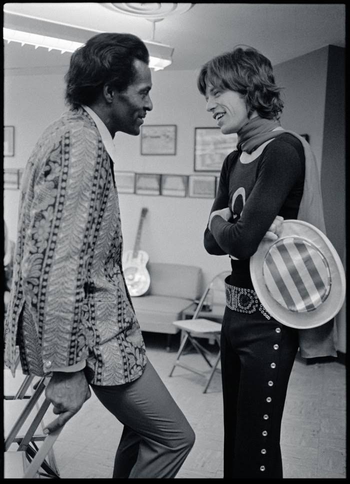 Mick Jagger of the Rolling Stones with Chuck Berry backstage, 1969.