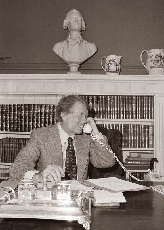 President-elect Jimmy Carter talks by telephone with British Prime Minister James Callaghan in London at Blair House in Washington, 1977.