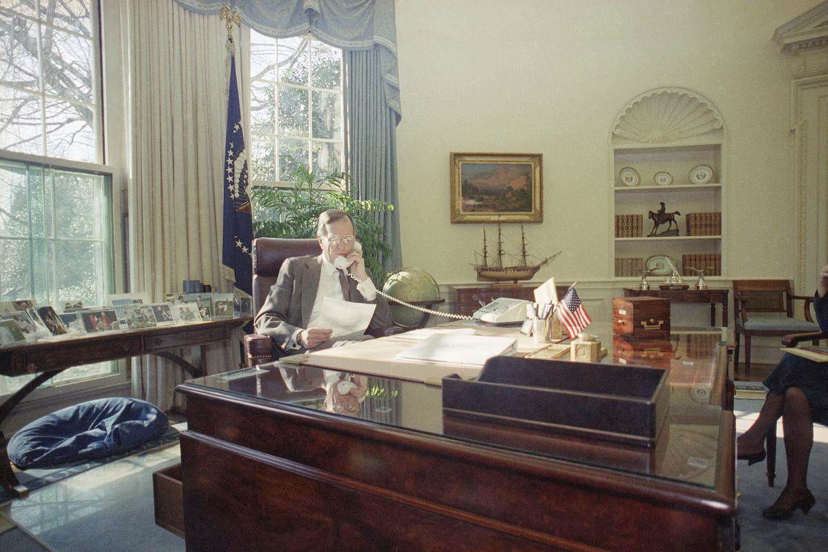 President George H. W. Bush speaks by telephone from the Oval Office of the White House to the "March for Life" rally in Washington, 1991.