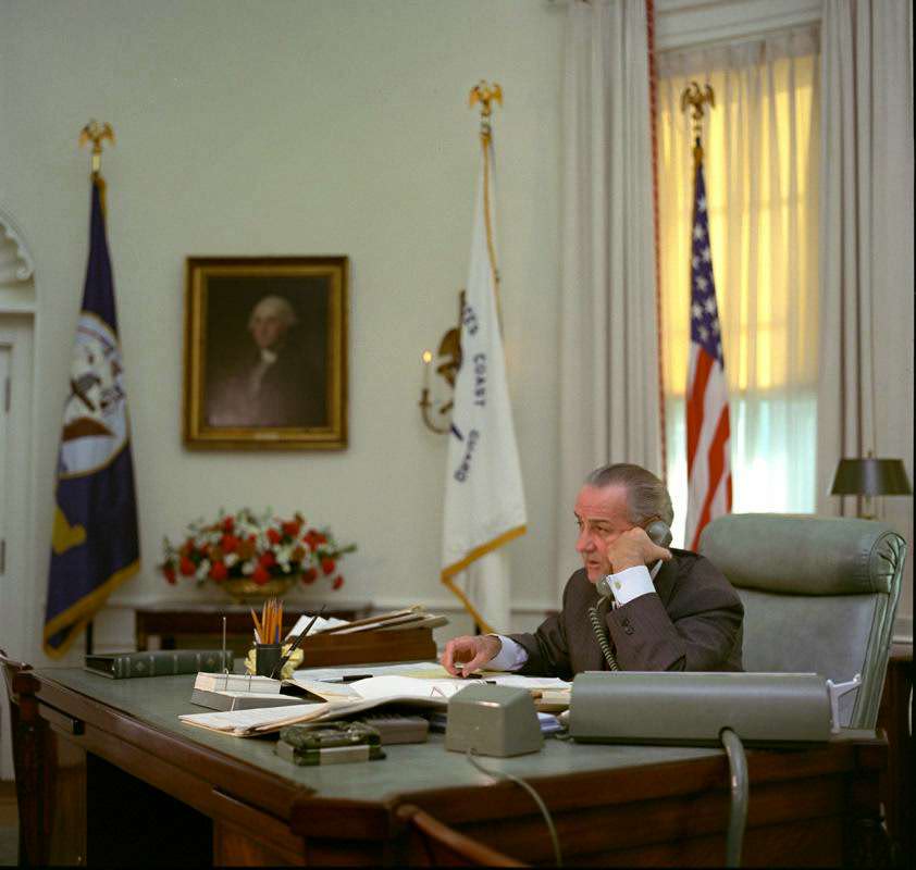 President Lyndon Johnson talks on the telephone at the White House in Washington, D.C.