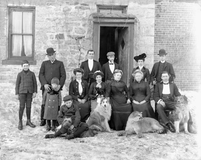 Lord Dundonald's servants posing with their pets, Ottawa, Ontario, 1904.