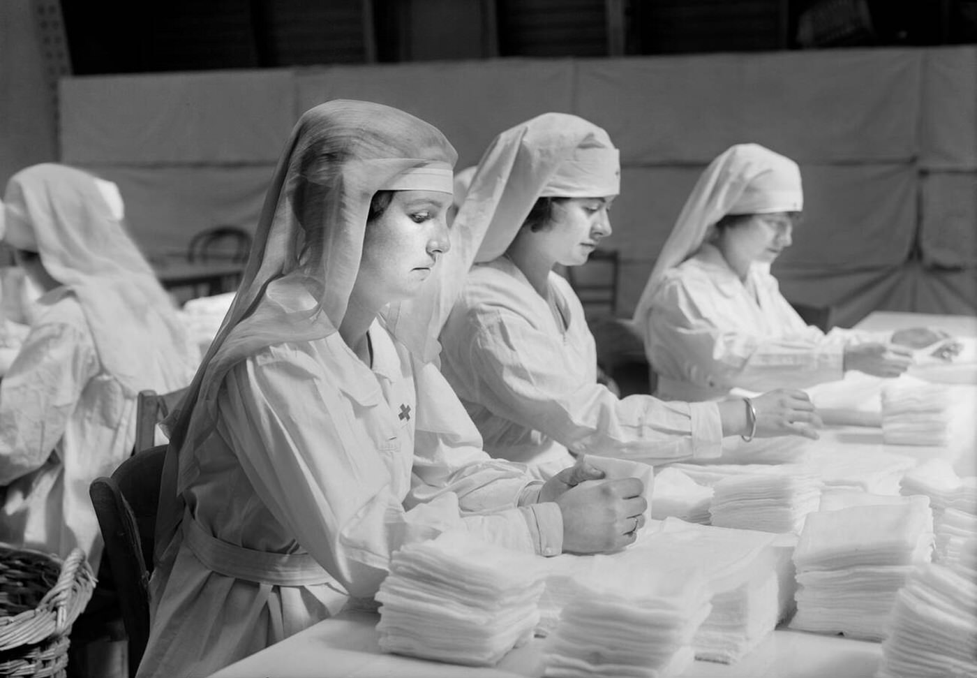 Folding Gauze Sponges in the American Red Cross Workrooms in Paris, France, 1918.