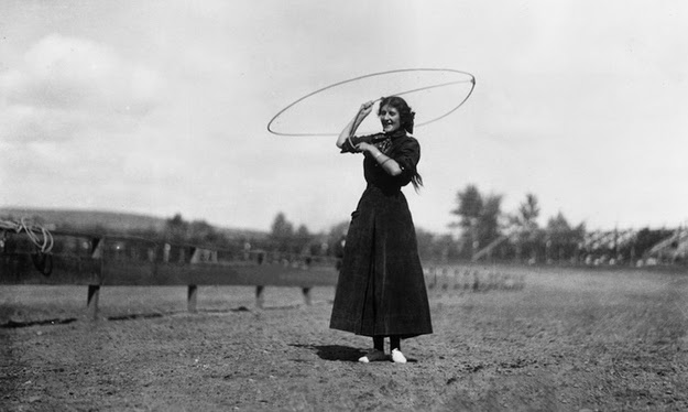 Roper Jane Burmudy performs a lasso dance, 1912.
