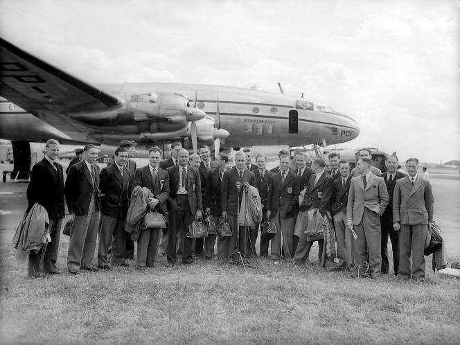 A major obstacle for FIFA proved to be organising the countries who would enter the tournament. Occupied Germany and Japan were both banned, while a number of countries from around the world pulled out of qualifying - citing reasons including travel costs to inexperience – though 15 teams from the Americas, Europe and Asia were eventually drawn into groups ahead of the competition. The England team (pictured), ready to make their World Cup debut, board a plane for Brazil.