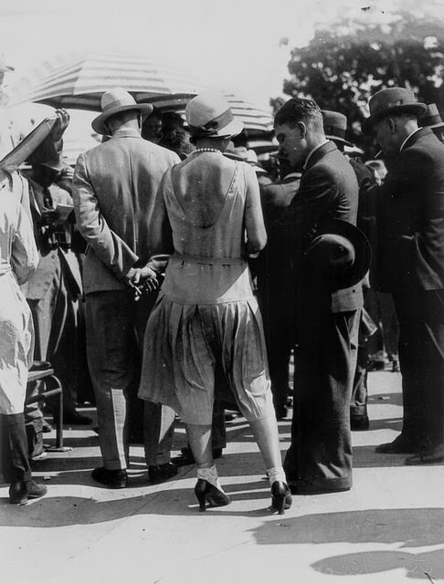 Young lady in a low backed dress and cloche hat at the races Brisbane ca 1931