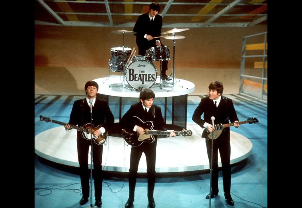 The Beatles perform on the Ed Sullivan Show in New York; an estimated 73 million viewers saw the performance, 1964.