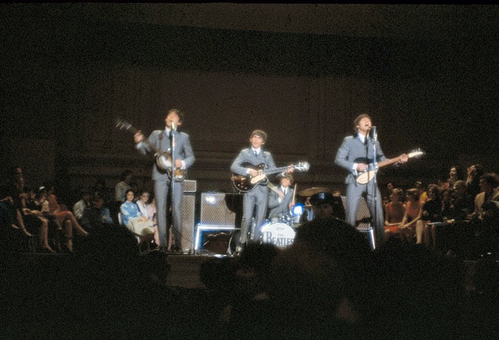 The Beatles perform at Carnegie Hall in New York City, 1964.