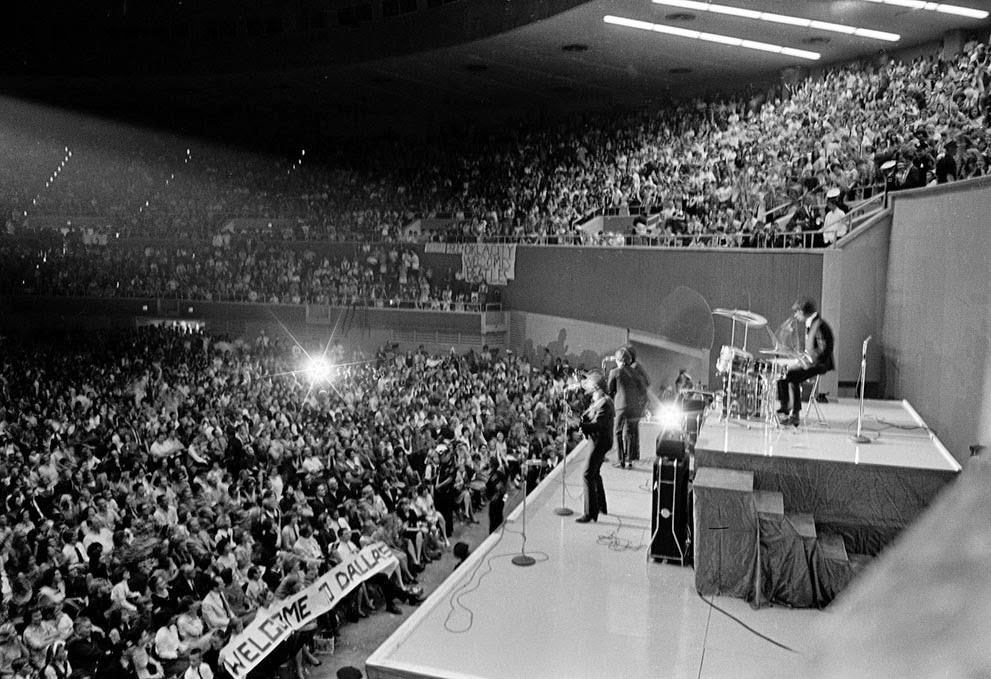 The Beatles perform at the Memorial Coliseum in Dallas, Texas, on their second U.S. tour, 1964.