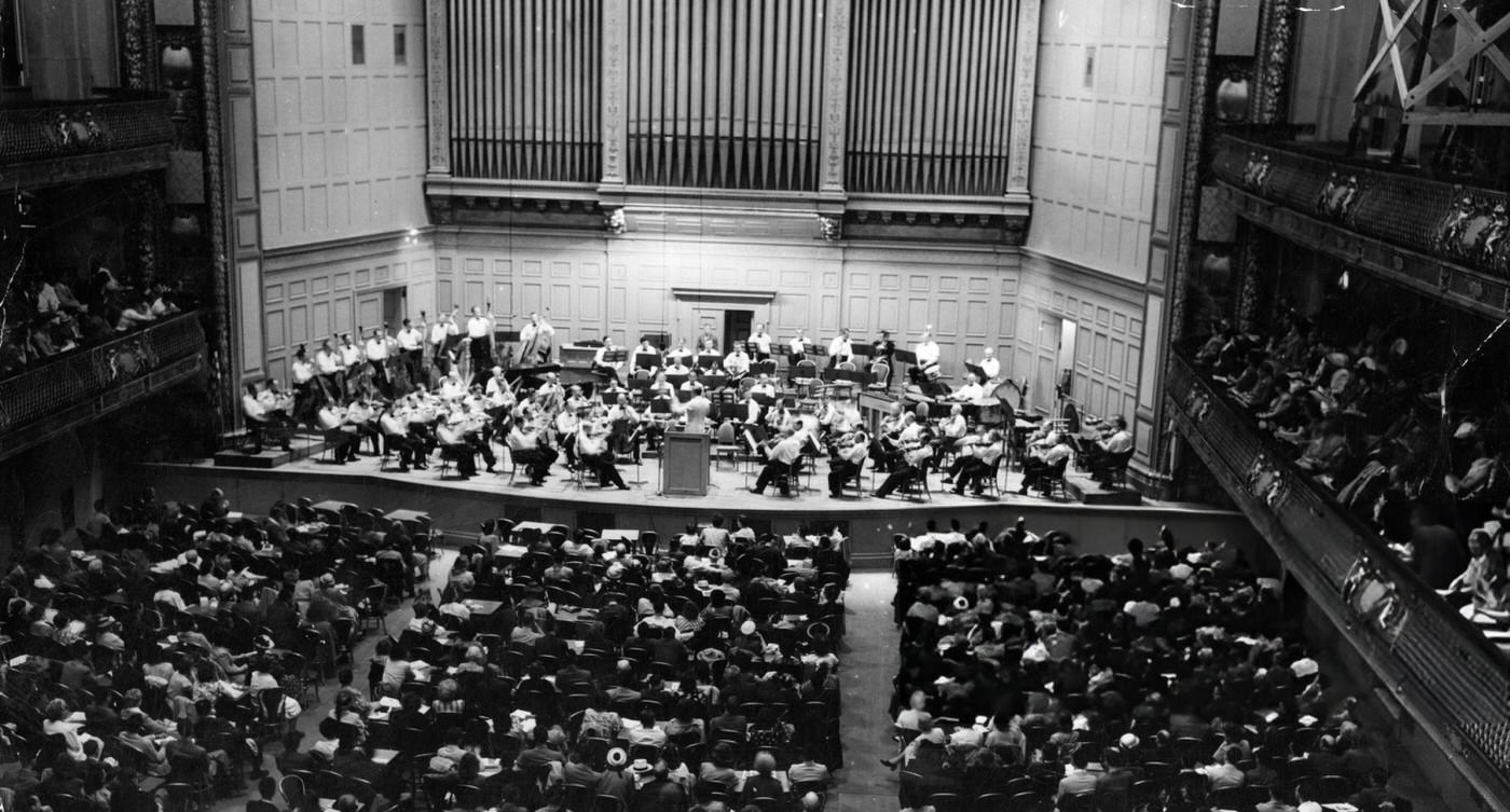 The crowd at the opening night of the 20th season of the Esplanade Concerts, played at Symphony Hall in Boston due to weather, 1948.