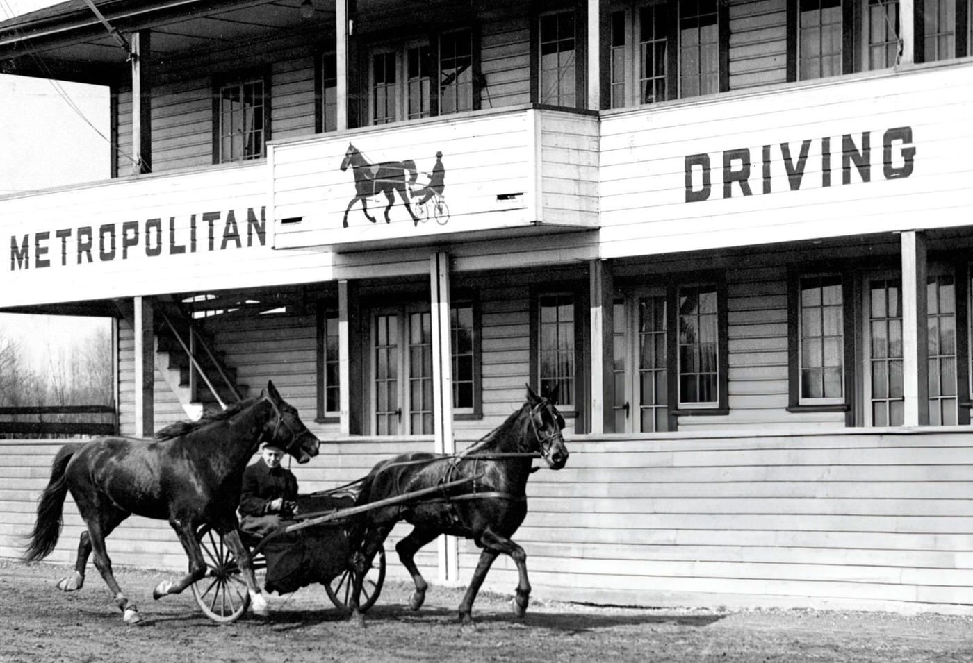 Driver Richard McLean exercises "Robbin Hanover" at the Metropolitan Driving Club on the Charles River Speedway in the Brighton neighborhood of Boston, 1947.