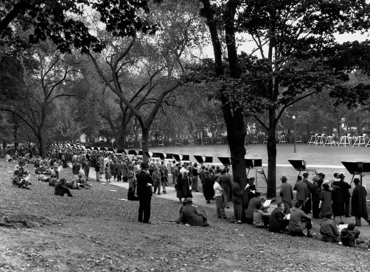 Fans view the Boston Braves vs Cleveland Indians game in the 1948 World Series Tournament on television sets on the Boston Common, 1948.