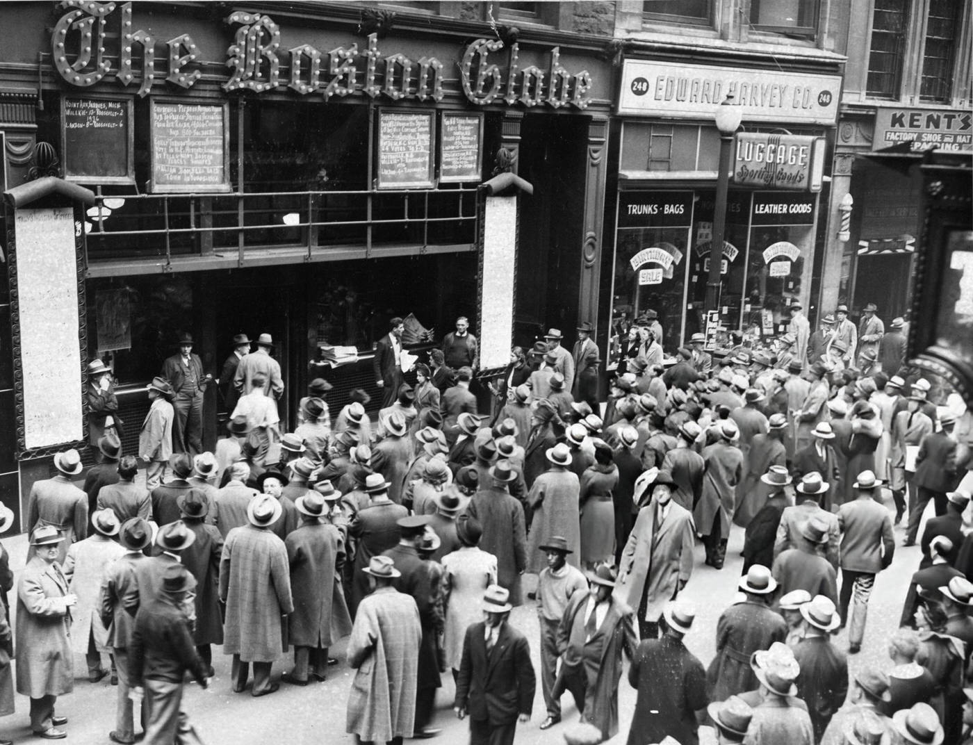 A crowd gathers outside The Boston Globe bulletin board displaying election results in Boston, 1940.