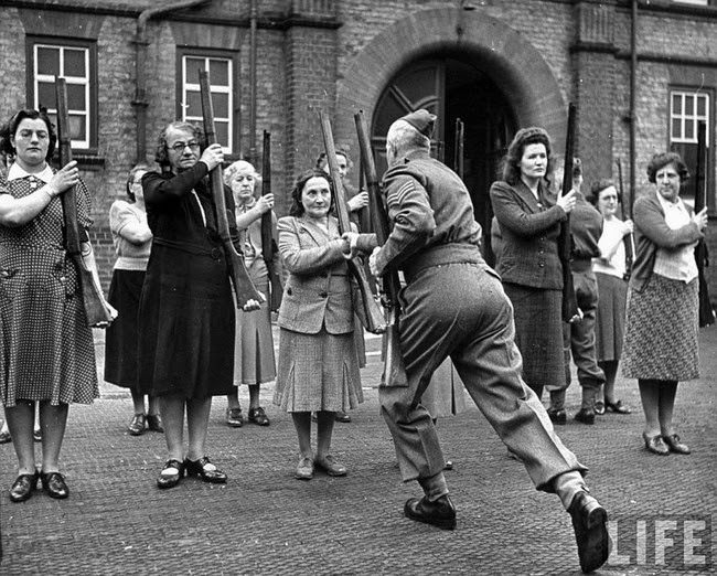 A British sergeant training members of the ‘mum’s army’ Women’s Home Defence Corps during the Battle of Britain, 1940.