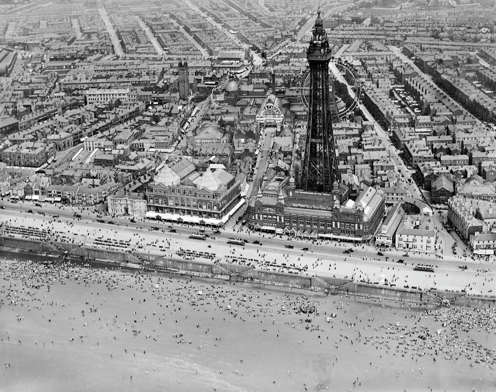 This remarkable shot of Blackpool Tower and the Winter Gardens was a speculative capture by an Aerofilms photographer and pilot as they navigated England’s north-west coastline in July 1920.