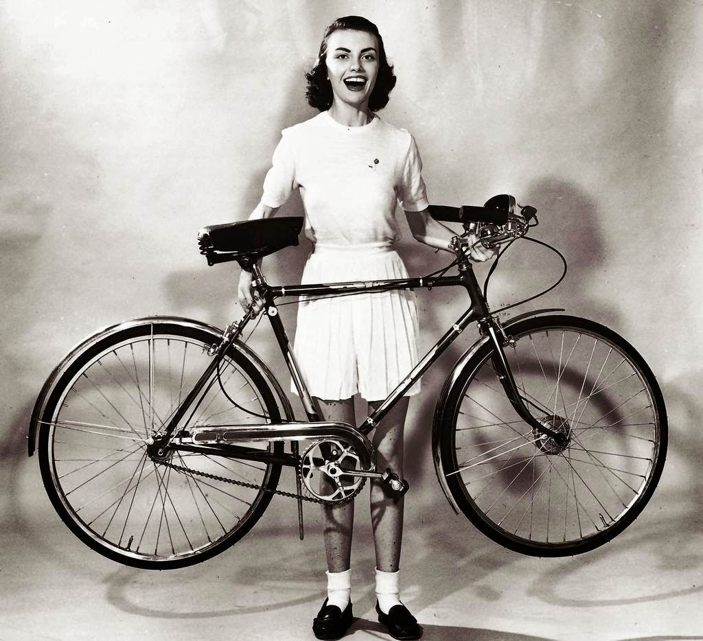 An American-made lightweight bicycle is advertised as the answer to the ever-growing demand for a "racer" or "touring" two-wheeler, 1953.