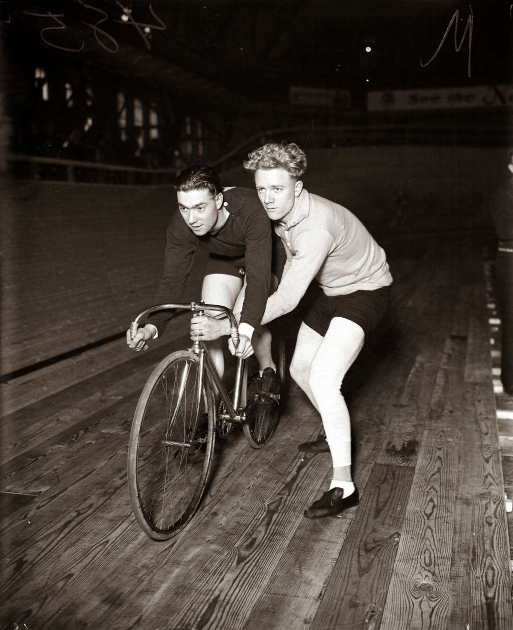 American teammates Freddie Spencer and Bobby Walthour Jr. competed in the six-day bicycle race at the Coliseum in Chicago, 1928.