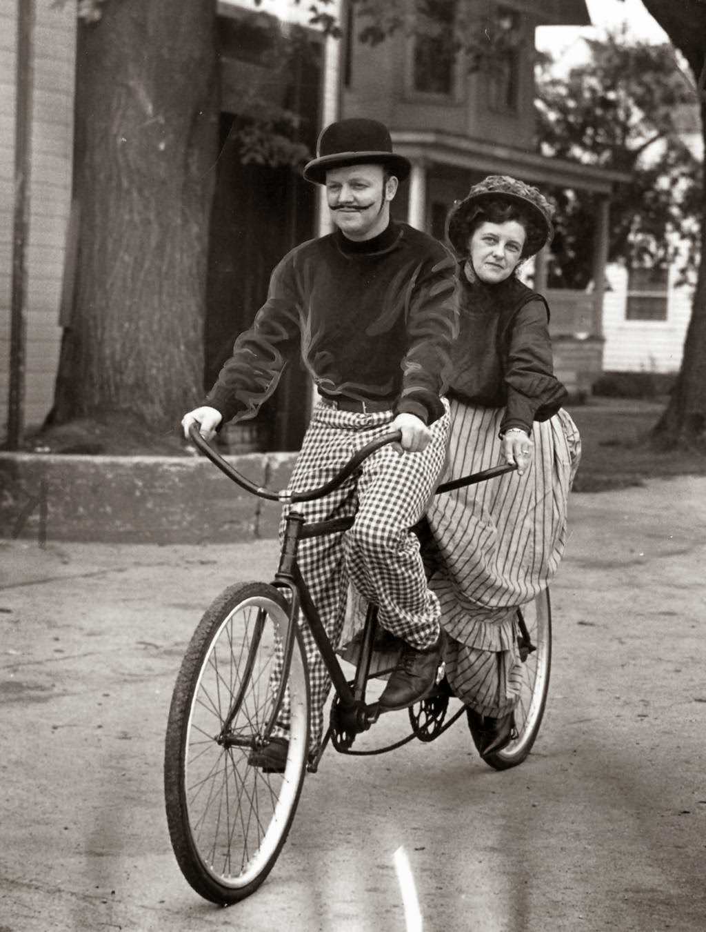 Mr. and Mrs. Wilbur Fredrick, of Huntley, Ill., on a tandem bike they rode in the town's centennial parade, 1951.