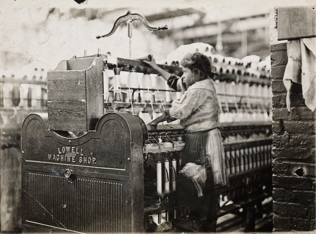 Little spinner in Bibb Mill No. 1, Macon, Ga. She was so small she had to climb up on to the spinning frame to mend broken threads. Jan. 19, 1909.