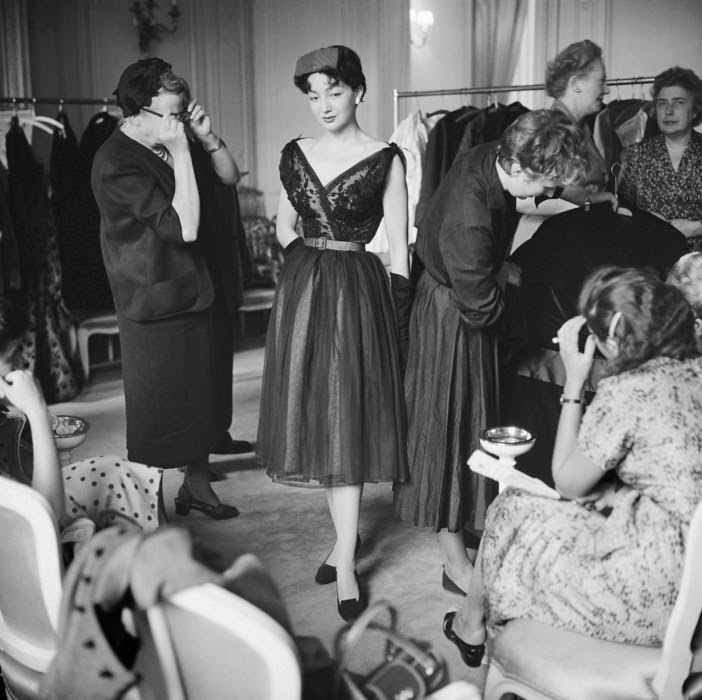 Buyers studied every piece of clothing to the maximum degree before being ordered at Christian Dior’s in-demand shows, Autumn-Winter 1953 haute-couture collection.