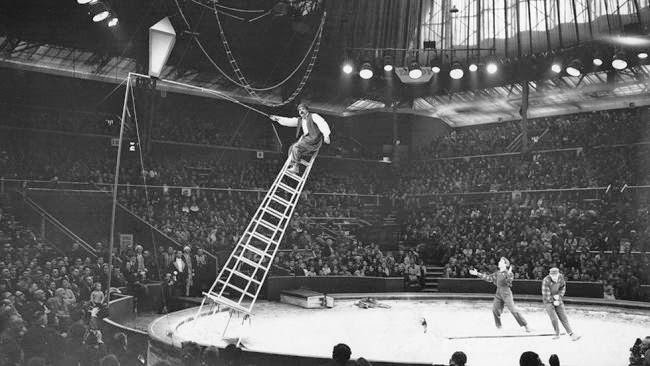 The Ghezzis, a comedy acrobatic team, perform at the Bertram Mills Circus at Olympia, London, 1959.