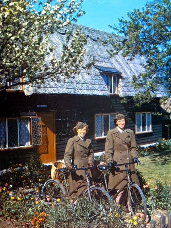 These WACs in England ride bikes from their quarters to their offices.