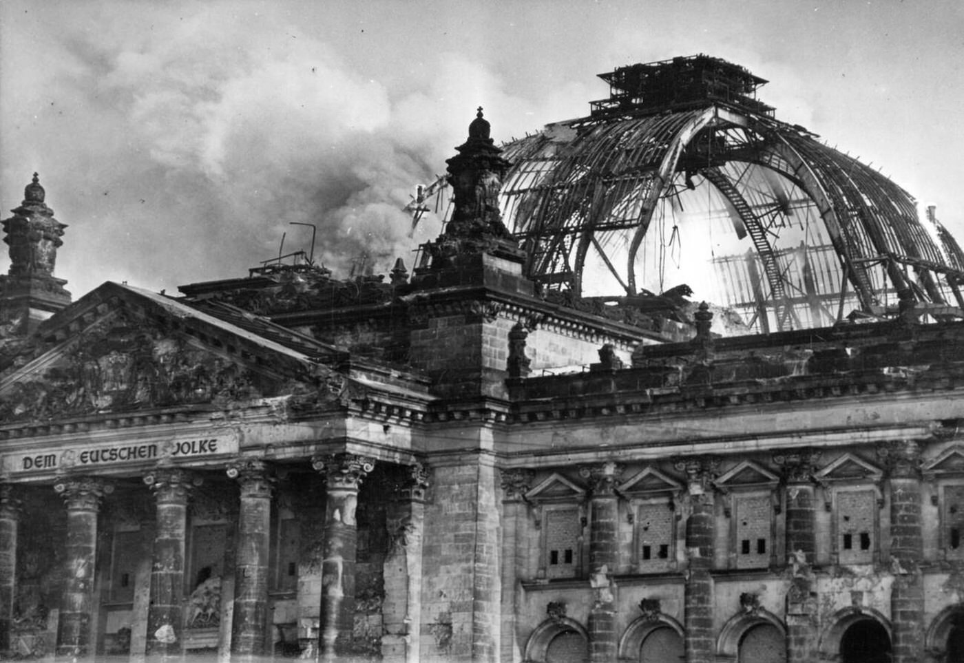 Blasting of the cupola of the Reichstag building in Berlin, with fire after the failed first attempt, 1954.
