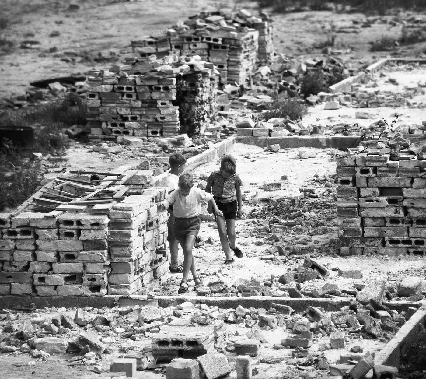 Children playing in the rubble in Berlin-Mariendorf, 1962.