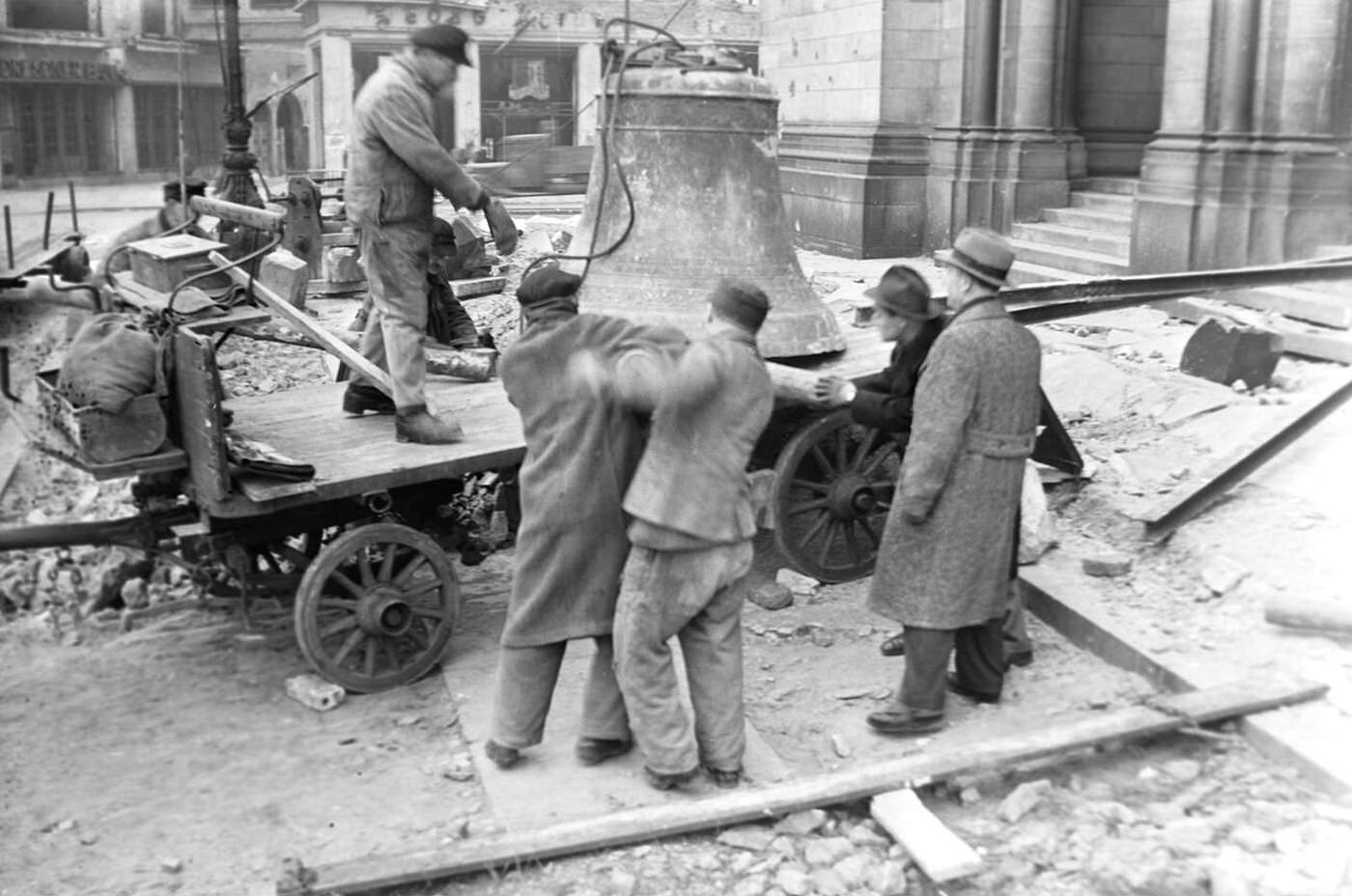 The last bell from the Kaiser Wilhelm Memorial Church destroyed during WWII is salvaged in Berlin-Charlottenburg, 1948.