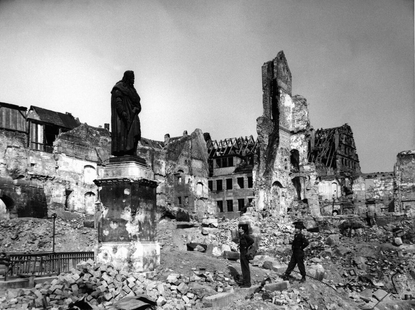View of the destroyed city of Nuremberg, with statue of Albrecht Duerer, 1945.