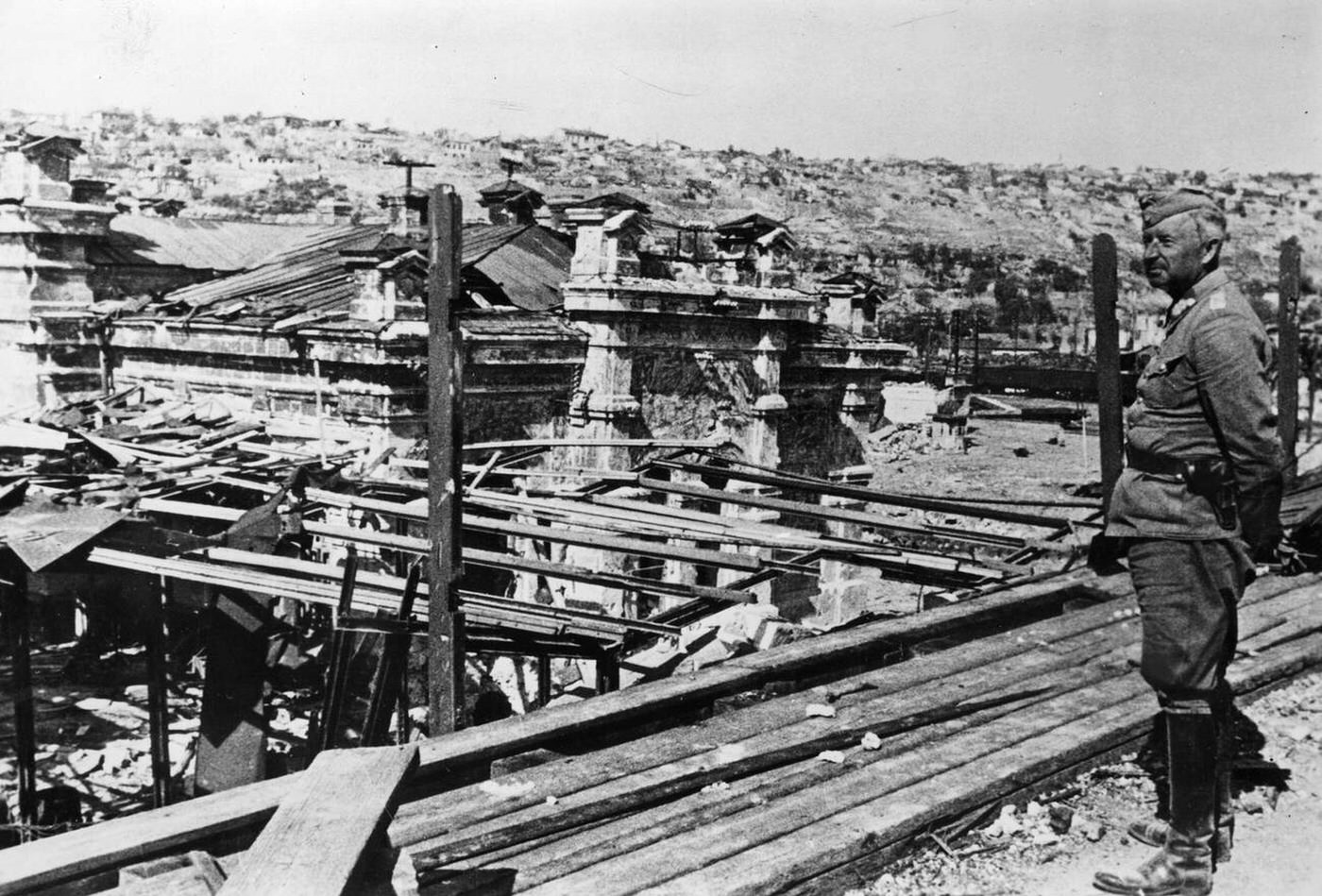 Wehrmacht Field Marshal Erich von Manstein looking at the ruins of Sebastopol, 1944.