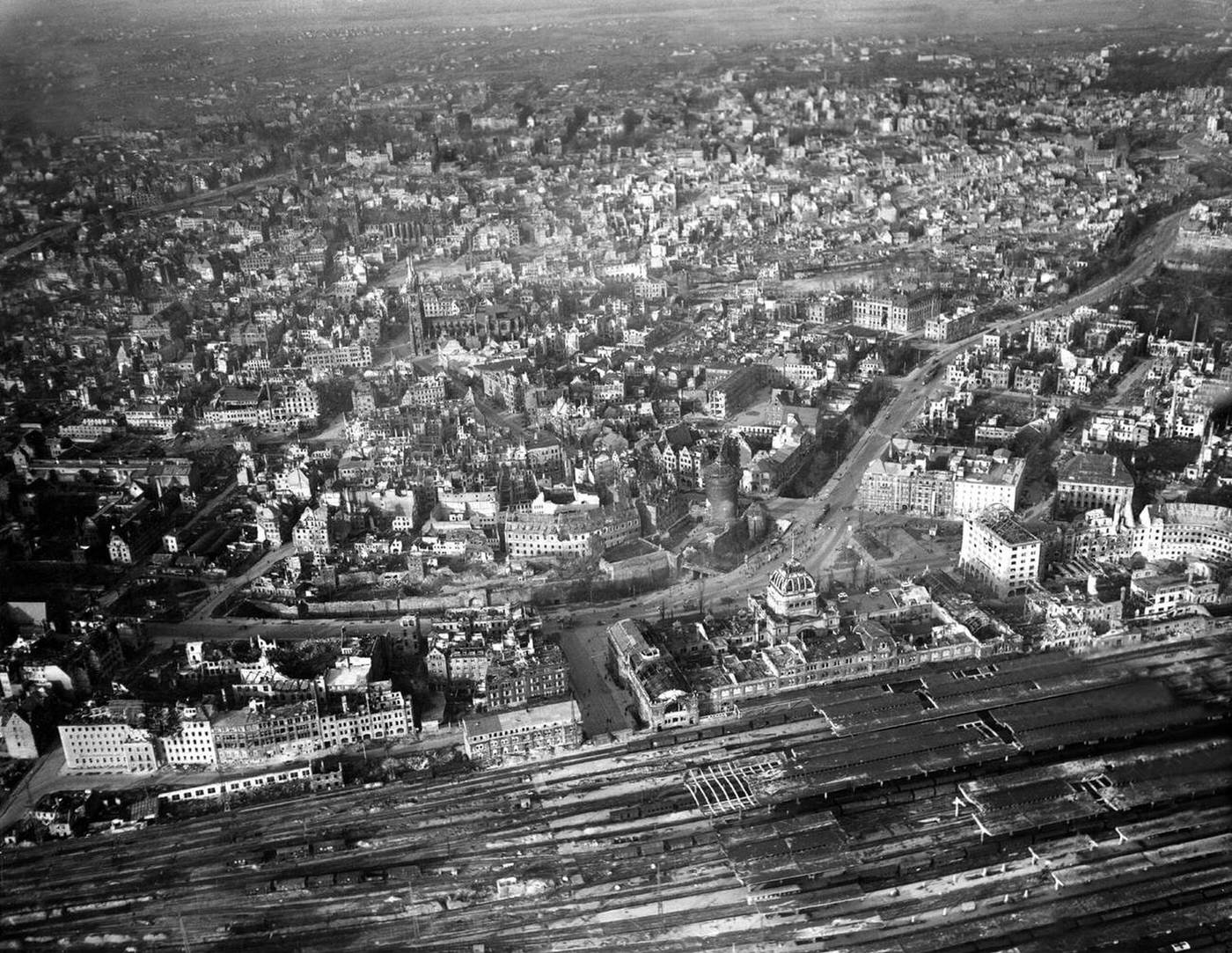 Aerial view of the central station and the city centre after the Allied air raids, Nuremberg, 1945.