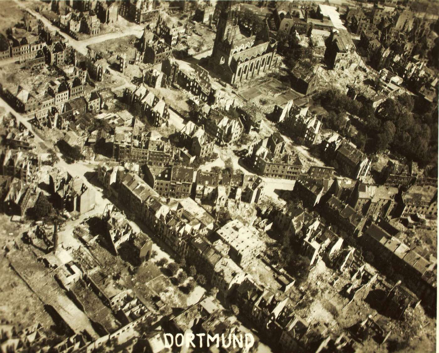 Aerial reconnaissance photograph showing the aftermath of bombing raids over Dortmund, 1941-1945.