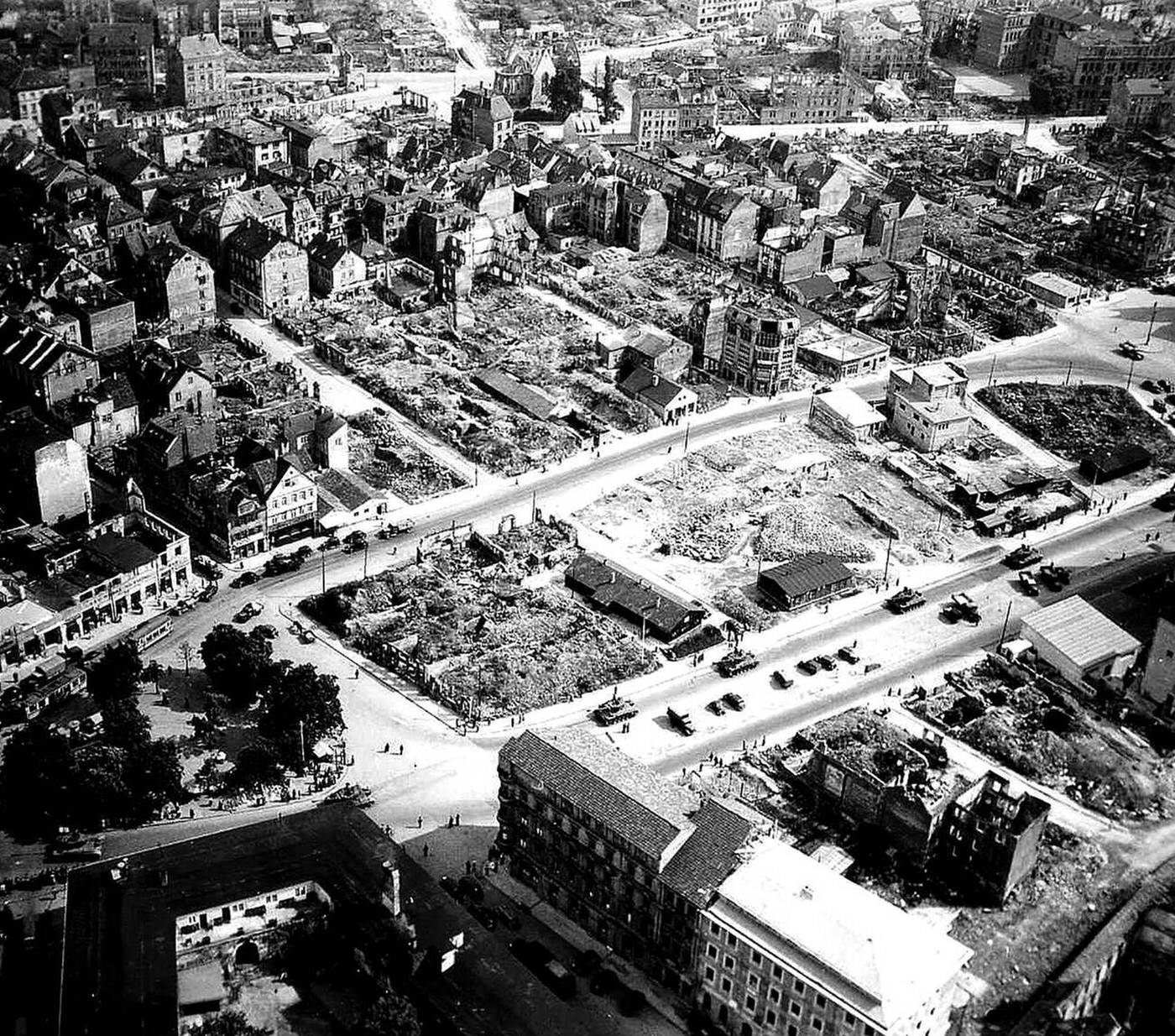 Tanks and vehicles of the 2nd Armored Cavalry Battalion, 2nd Armored Division, pass through Stuttgart, 1950.