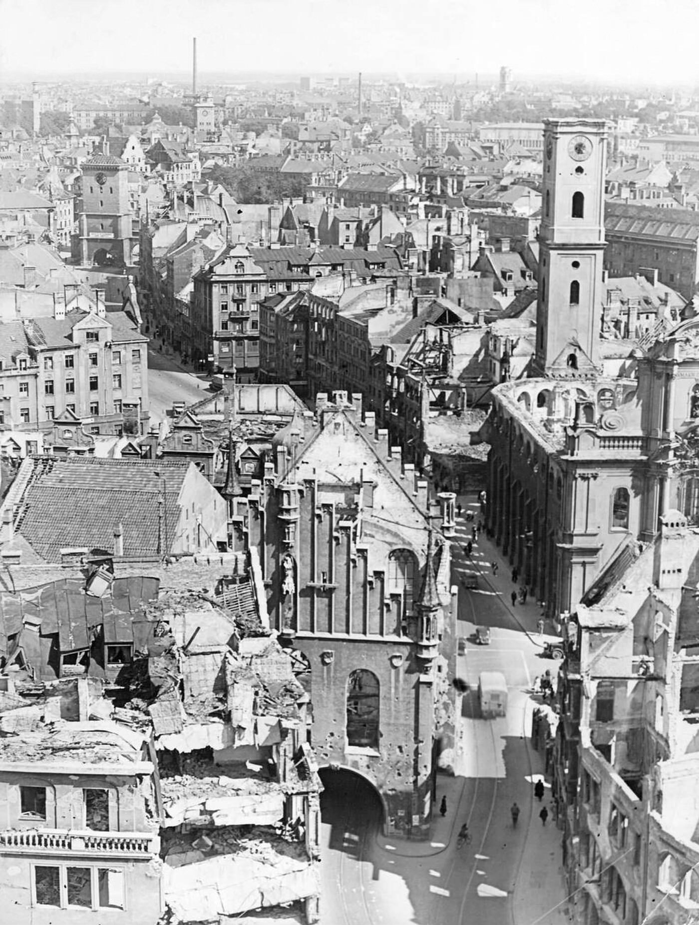 View of the damaged Old Town Hall and Heiliggeistkirche after the allied bombing in Munich, Germany, 1945.
