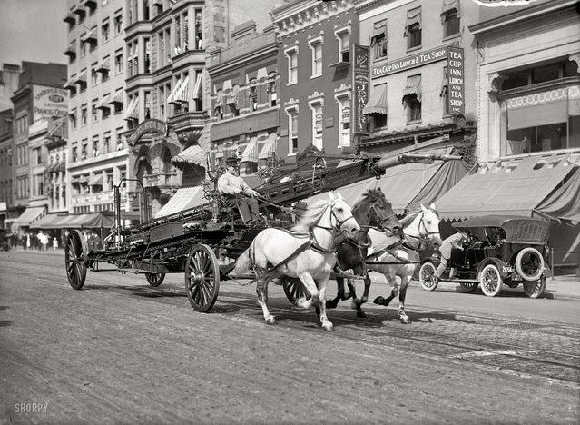 Washington, D.C., circa 1914. "Three-horse team pulling water tower." A fire truck racing past the Tea Cup Inn on F Street. Harris & Ewing.