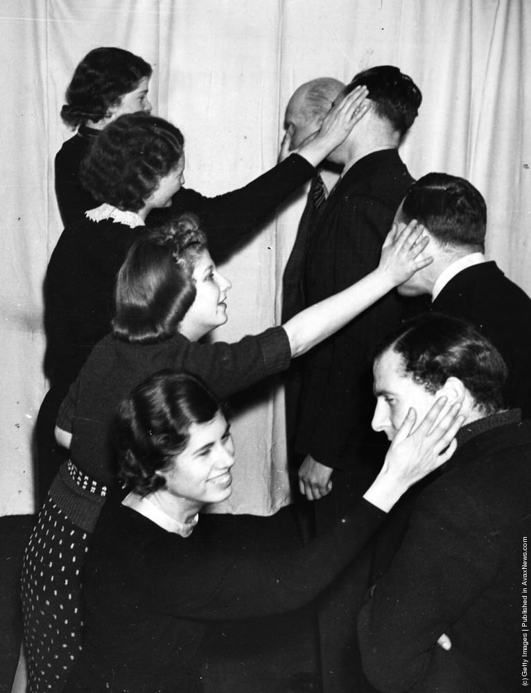 Four students at a Liverpool drama school enjoy a lesson in face-slapping, 1939.