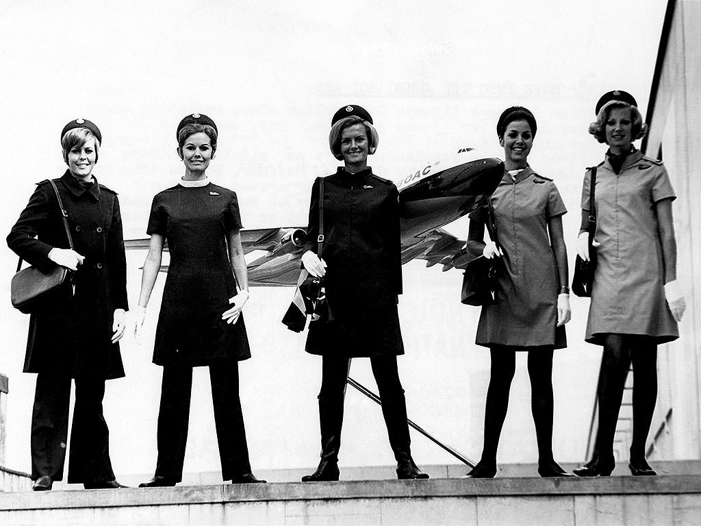 Air hostesses in shorter skirts at a London airport pose in 1969.
