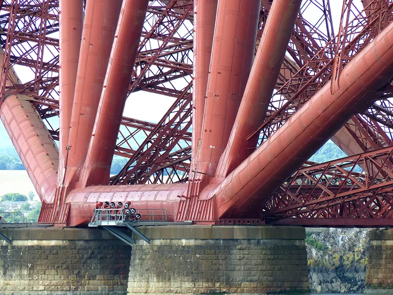 Close up on the base of one of the three double-cantilevers of the bridge.