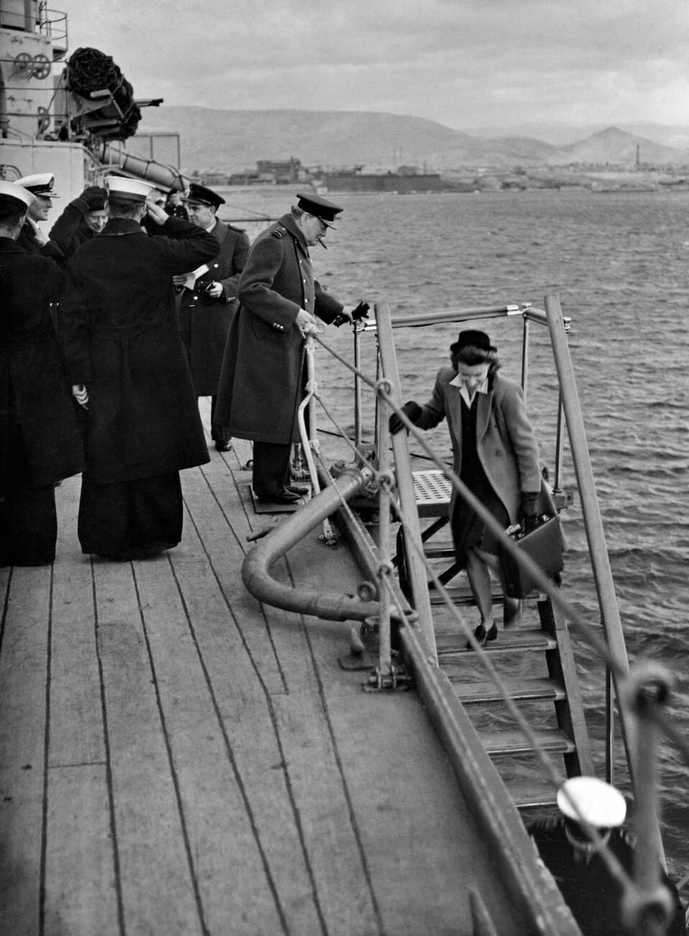 Winston Churchill disembarking HMS Ajax at Athens, Greece to attend a conference with the Greek government, 1944.