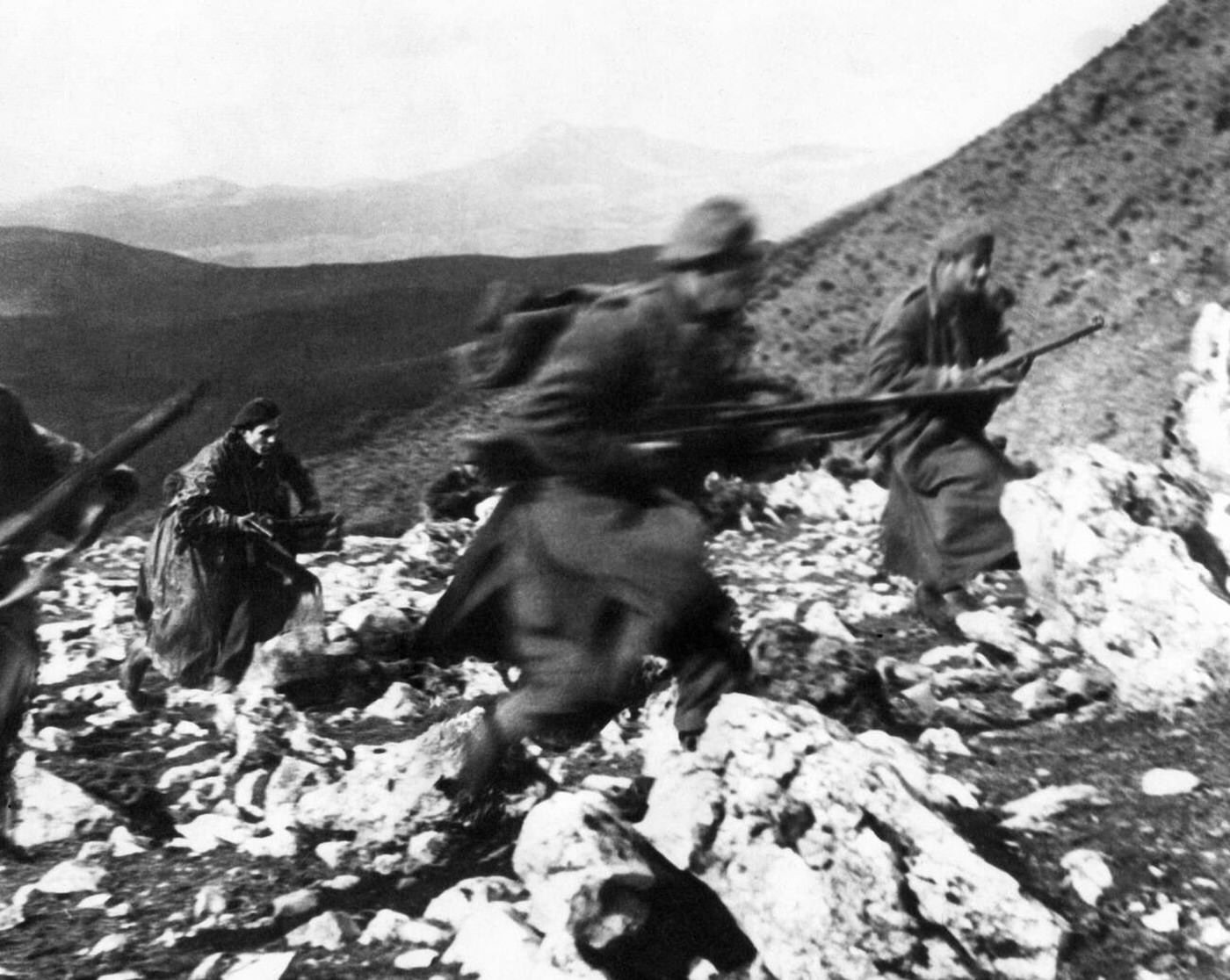 Government troops advancing during engagements at Konitzsa, Greek Civil War, 1940s.