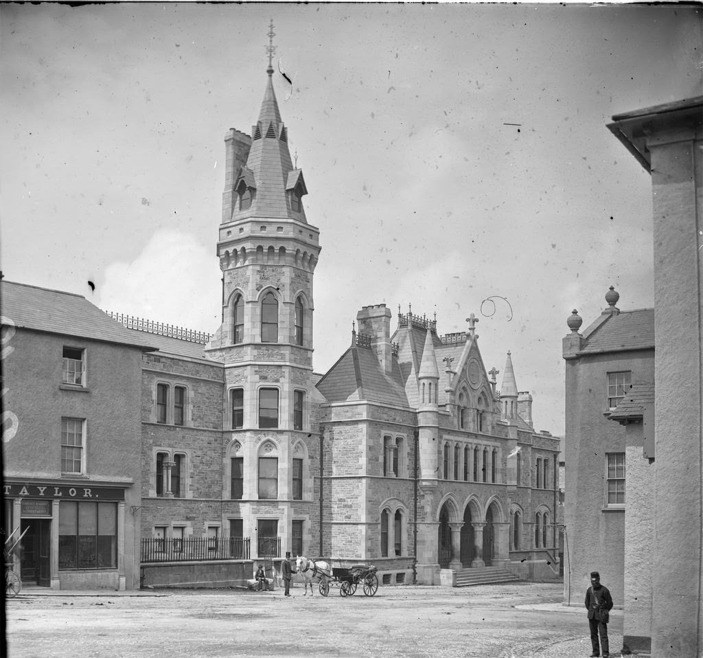 Pub, building in street with hexagonal tower, 1880s
