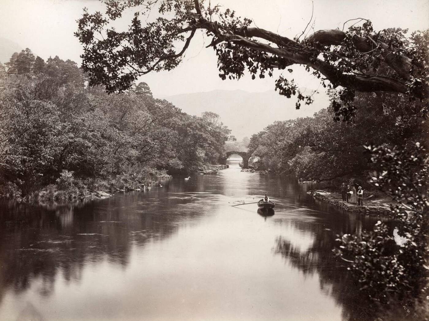 'Meeting of the Waters' Killarney, Ireland, rowing boats on the water, 1800s.