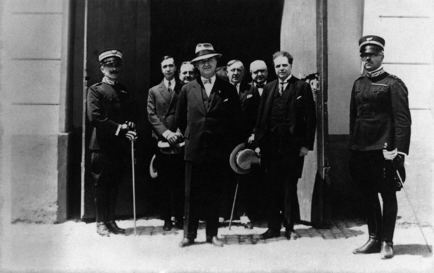 Italian politician and President of the Royal Academy of Italy (Reale Accademia d'Italia) Luigi Federzoni leaving the Farnesina Palace with Italian composer Pietro Mascagni and Italian writer and director Lucio D'Ambra, Rome, Italy, 1930s.