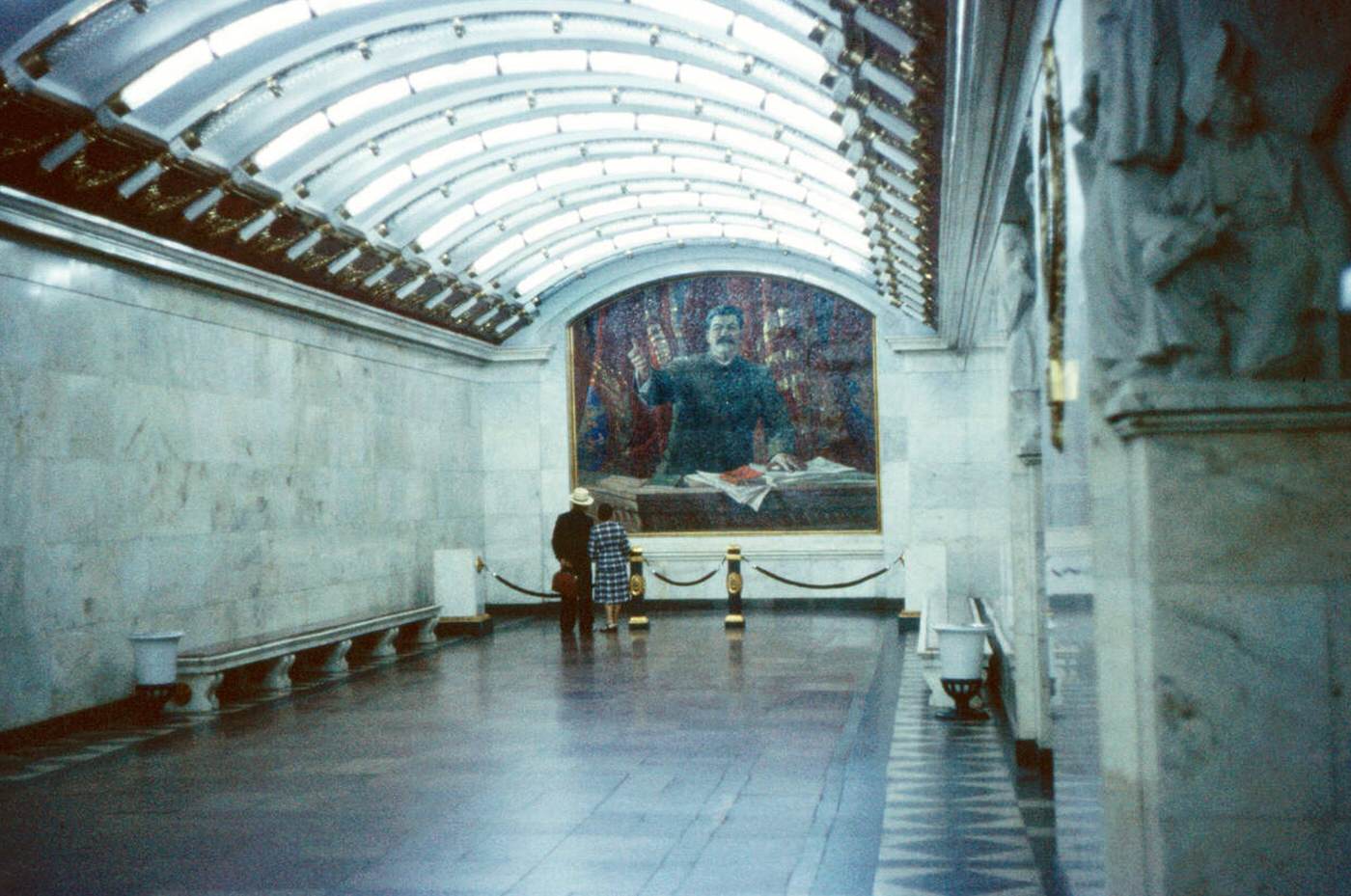 Two People Viewing Portrait of Joseph Stalin, Metro Station, Leningrad (St. Petersburg), 1958.