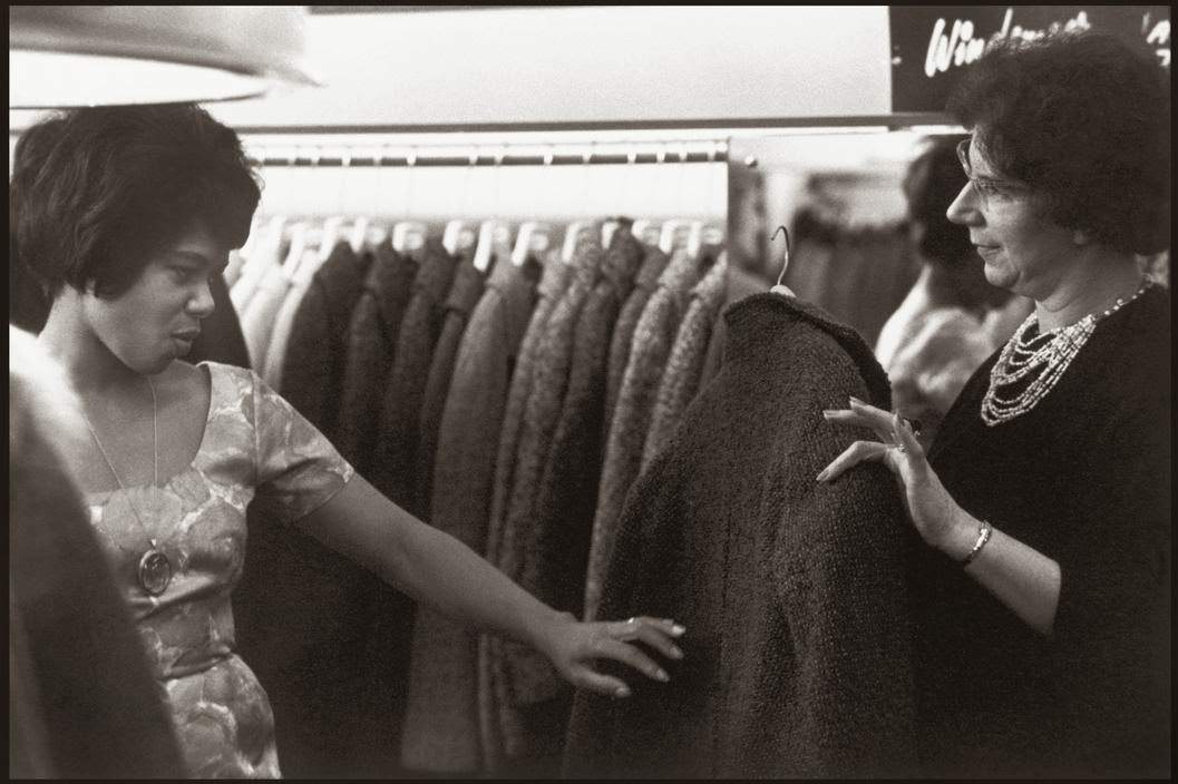 A black actress shops in Oxford Street, London.